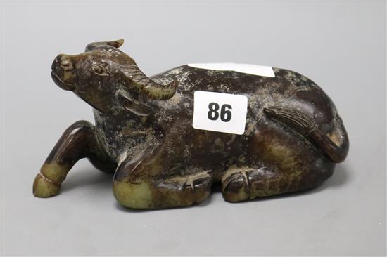 A Chinese hardstone recumbent buffalo length 18cm